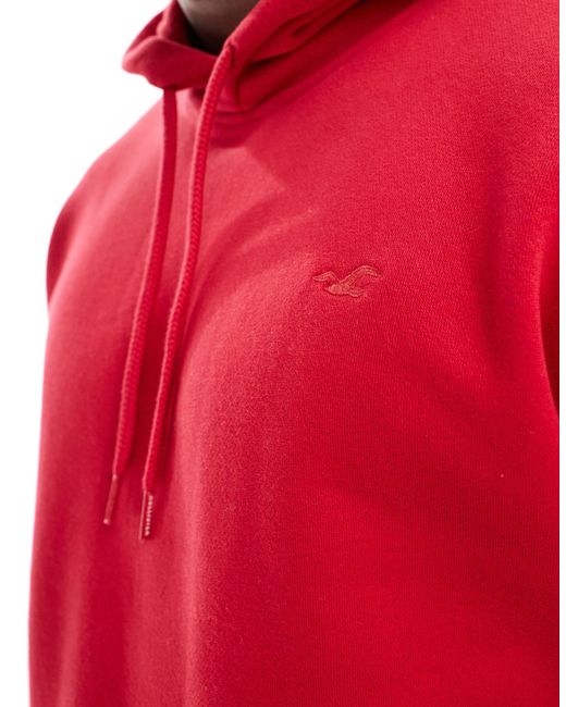 Felpa rossa con cappuccio e logo iconico di Hollister in Red da Uomo