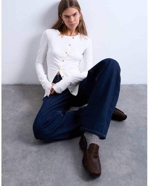 topshop-asymmetric-button-through-long-sleeve-top-in-blue-lyst