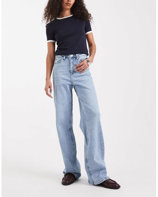 Jean large à taille haute - clair délavé Vero Moda en coloris Blue