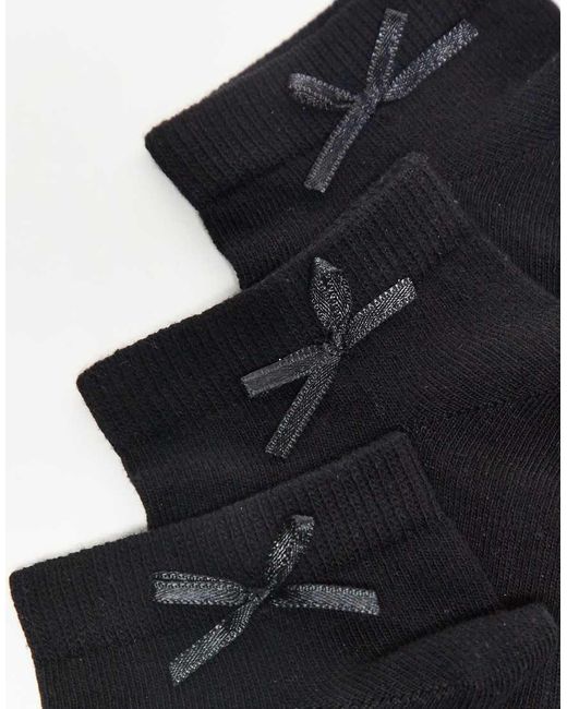 Pack De 5 Pares De Calcetines Negros Para Zapatillas De Deporte Con Lazo En La Parte Trasera De ASOS de color Black