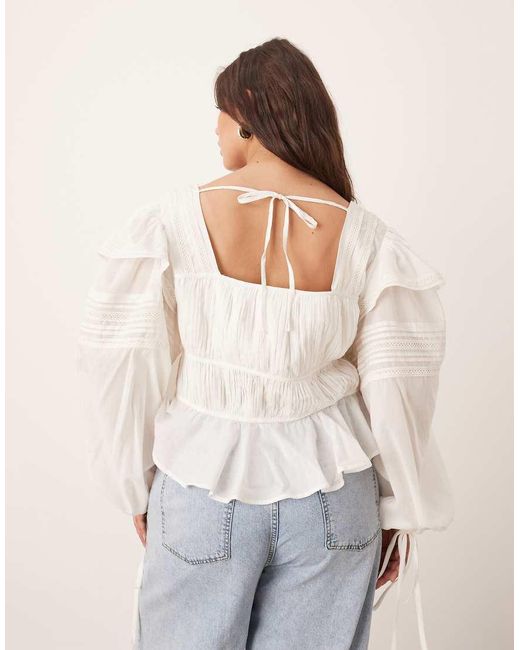 Blusa Blanca De Voile De Algodón Con Lazada Delantera Y Ribete De Encaje De Curve ARRANGE de color White