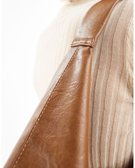 Bolso tote grande marrón con diseño curvado ASOS de color Blue