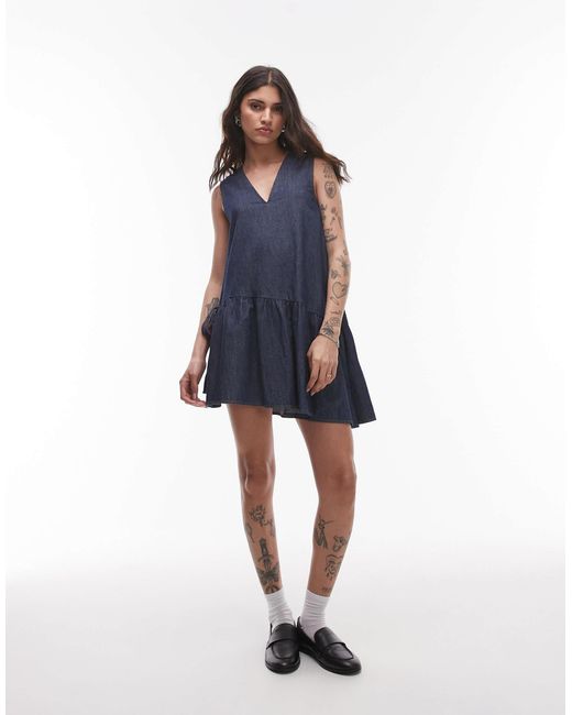 TOPSHOP Blue Denim Mini Dress With Peplum Hem And Bow Detail