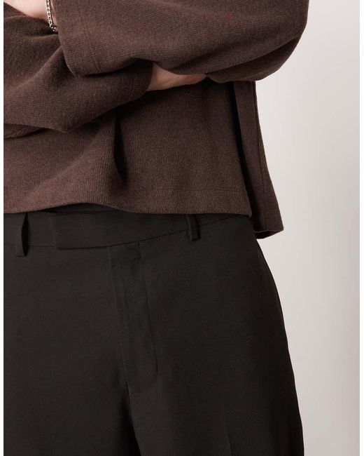 ASOS Nette Ruimvallende Broek Met Toelopende Pasvorm in het Black voor heren