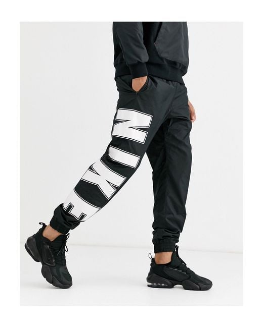 Jogger resserré aux chevilles à grand logo Nike pour homme en coloris Noir  | Lyst