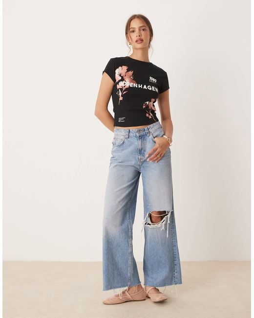 ASOS Black Baby Tee With Copenhagen Bleach Flower Graphic