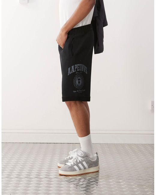 Aape by a bathing ape - short molletonné à logo Aape By A Bathing Ape pour homme en coloris White
