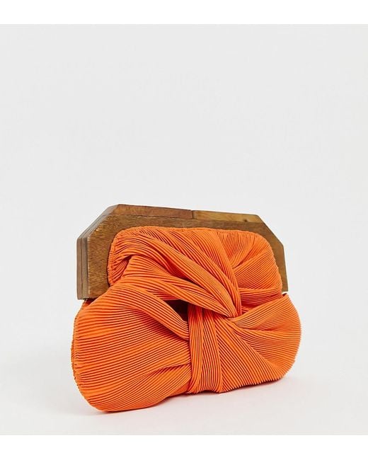 Bolso clutch con diseño plisado en naranja y cierre de efecto madera  Accessorize de color Naranja | Lyst