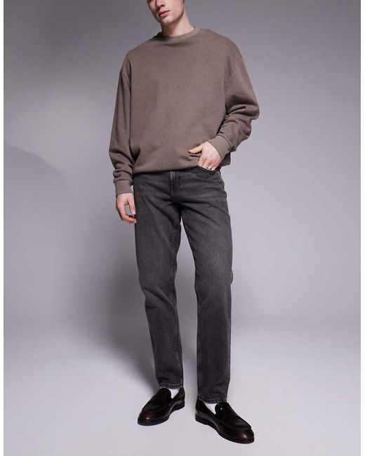 Vaqueros Negros De Corte Tapered Con Lavado Grisáceo De ASOS de hombre de color Gray