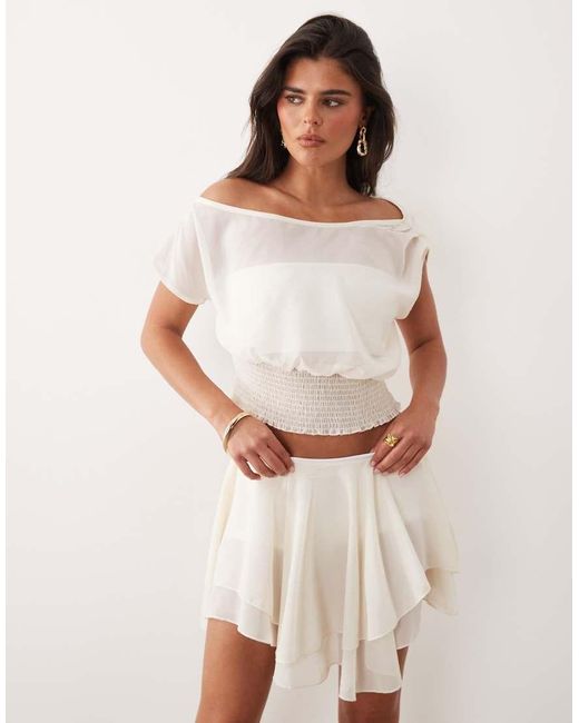 The Frolic Natural Exclusive Chiffon Drape Off Shoulder Shirred Waist Top