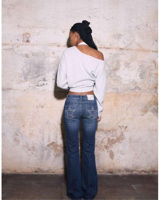 Stradivarius Blue Embroidered Pocket Bell Bottom Jeans