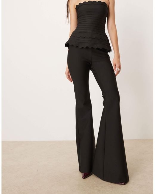 Amy Lynn White Flared Pants