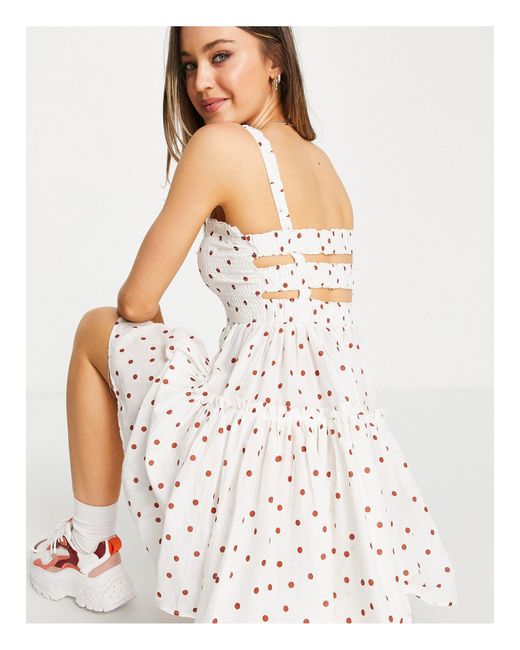Robe D Ete Courte A Bretelles Et Bords Bruts Avec Pois Rouille Creme Coton Asos Lyst