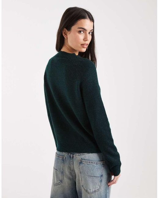 Jersey Verde Intenso Con Cuello Alto De Pieces de color Blue