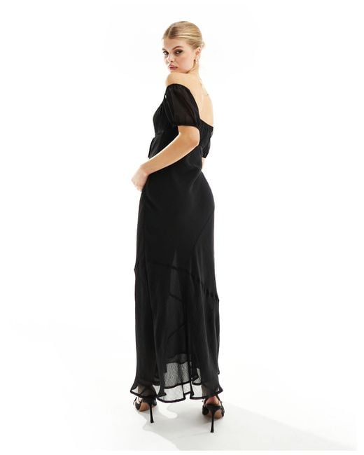 Robe mi-longue en mousseline texturée avec buste tendance folk à encolure bardot et coutures visibles ASOS en coloris Black