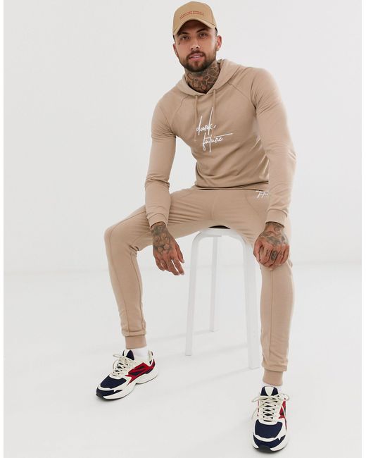 beige tracksuit mens