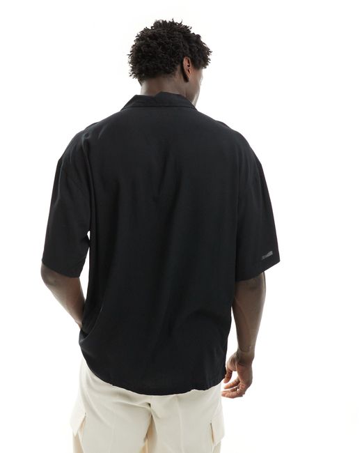 Camicia oversize nera con colletto con rever di ADPT in Black da Uomo