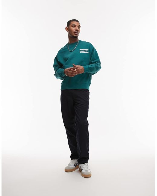 Sudadera Con Estampado Gráfico De Catálogo De Carhartt de hombre de color Blue