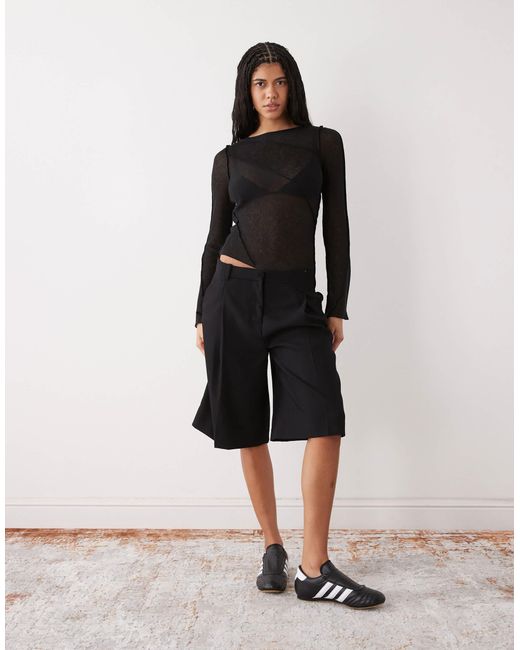 Rahtech Weekday Weekday Asymmetric Long Sleeve Mesh Top With Seam Detailling in Black ...