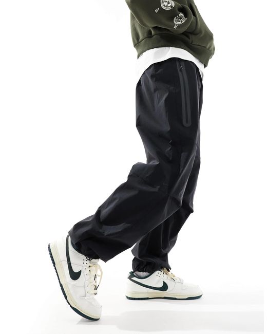 Nike Black Tech Woven Oversized Pants for men
