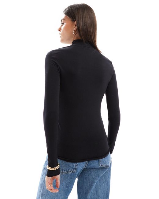 Femme - t-shirt à manches longues et col montant SELECTED en coloris Black