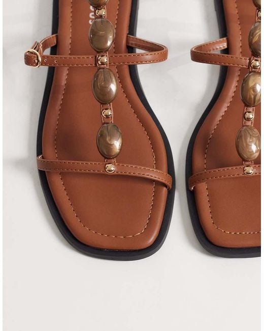Glamorous Brown Flat Tie Leg Sandals With Beads