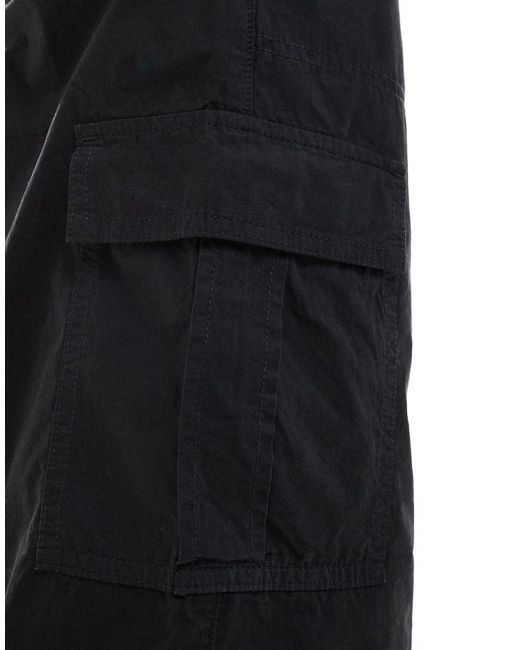 Pantalones Cargo Negros Holgados Sin Cierres De ASOS de hombre de color White