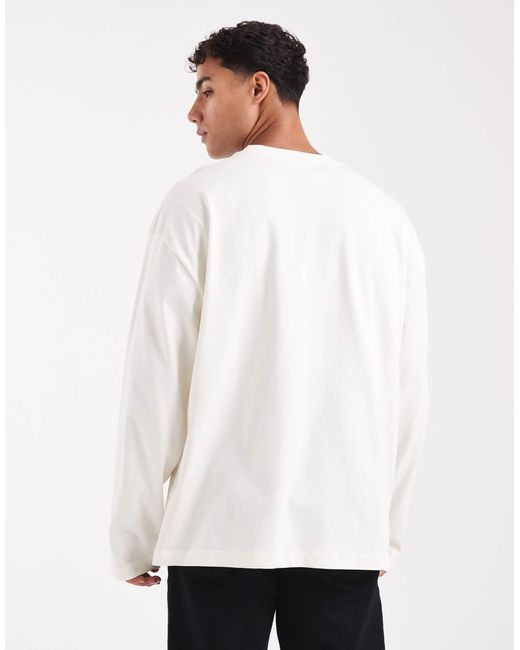 712 Asos ASOS Heavyweight Oversized Long Sleeve T-Shirt With Printed Chest Badge ...