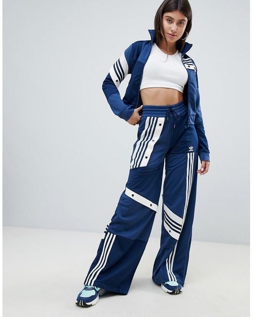 X Danielle Cathari - Pantalon Adidas Originals en coloris Blue