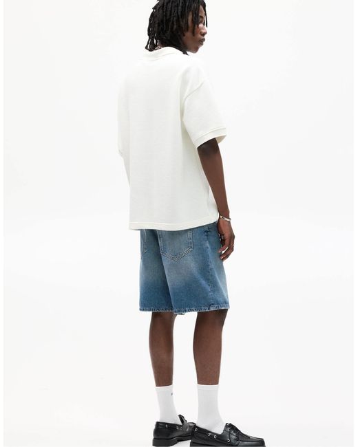 Polo en maille à slogan brodé - cassé Pull&Bear pour homme en coloris Blue