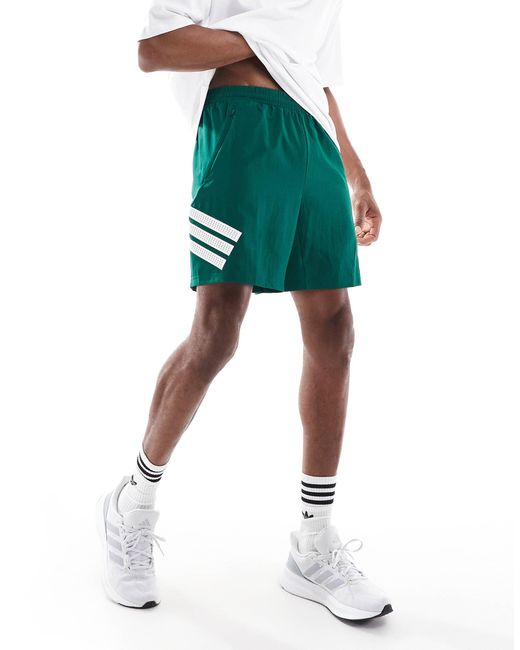 Adidas Originals Green Adidas Training Essentials Gym 3 Stripe Shorts for men