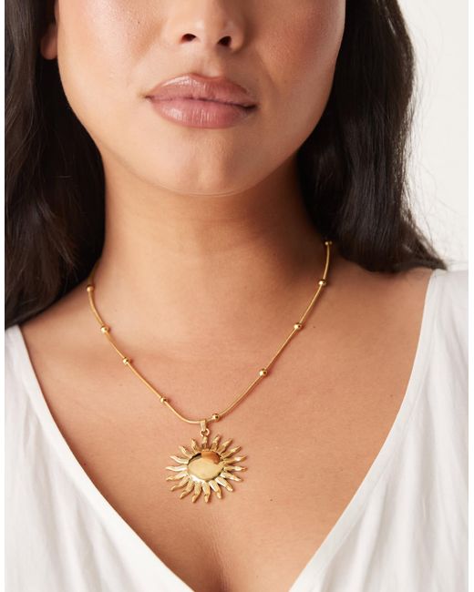Asos design curve - collier en acier inoxydable imperméable avec pendentif soleil ASOS en coloris Natural