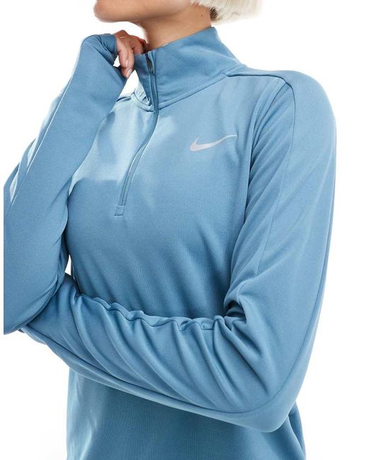 Top Azul De Manga Larga Con Media Cremallera Dri-Fit Pacer De Nike de color Blue