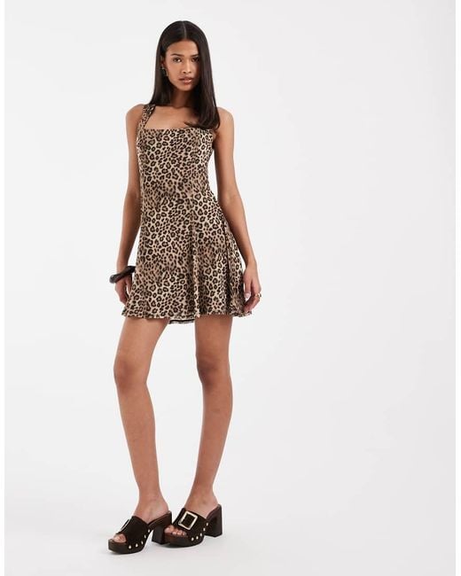 ASOS White Printed Leopard Mesh Mini Dress With Flippy Hem