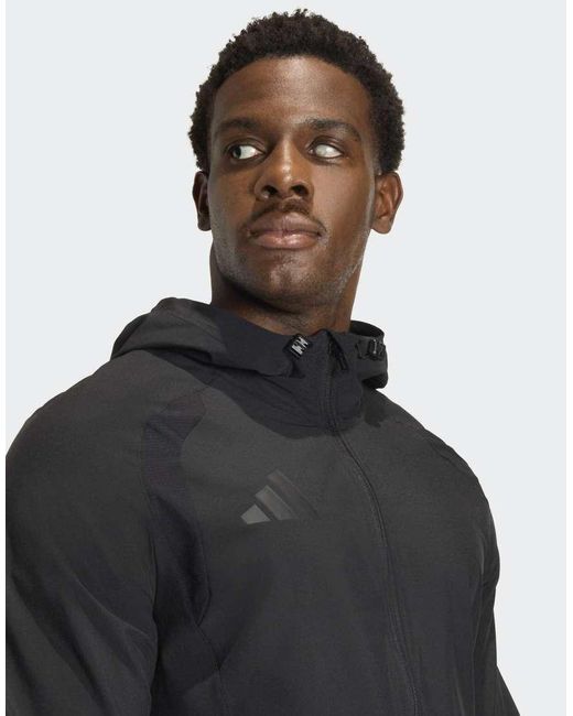 Adidas Originals Black Tiro Travel Windbreaker Jacket for men