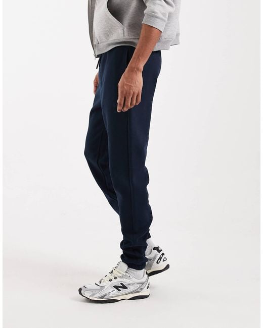 ASOS – schmal geschnittene basic-jogginghose in White für Herren