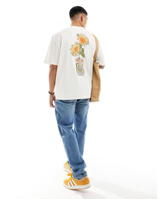 T-shirt oversize sporco con stampa di girasole sul retro di ASOS in White da Uomo