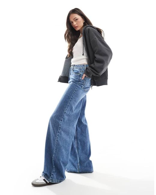 Vaqueros Azules De Pernera Ancha Con Lavado Medio Y Acabado Suave De Asos Design Tall ASOS de color Blue