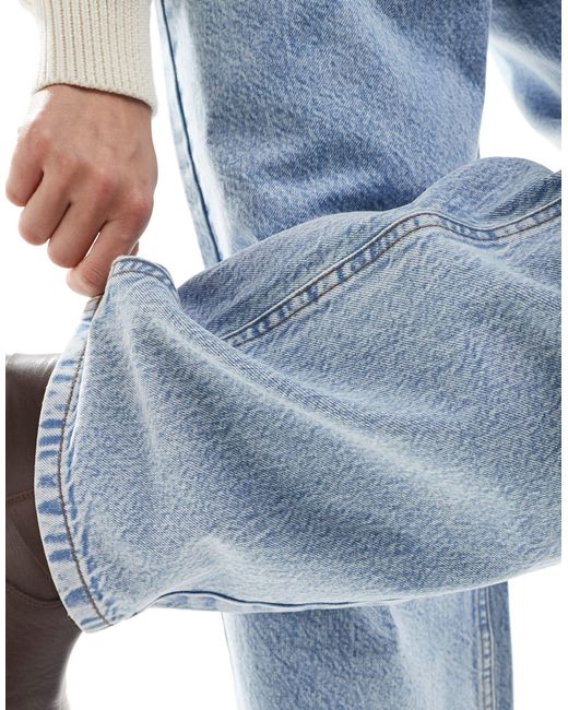 Jeans ampi lavaggio chiaro di ASOS in Blue