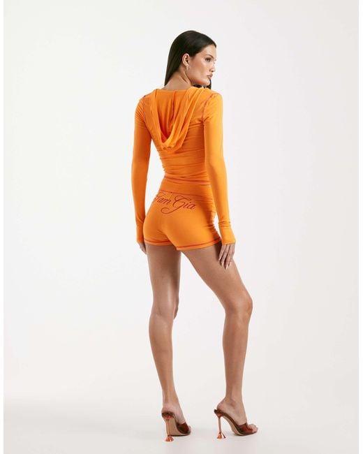 I.AM.GIA Orange Blare Logo Back Print Contrast Stitch Shorts