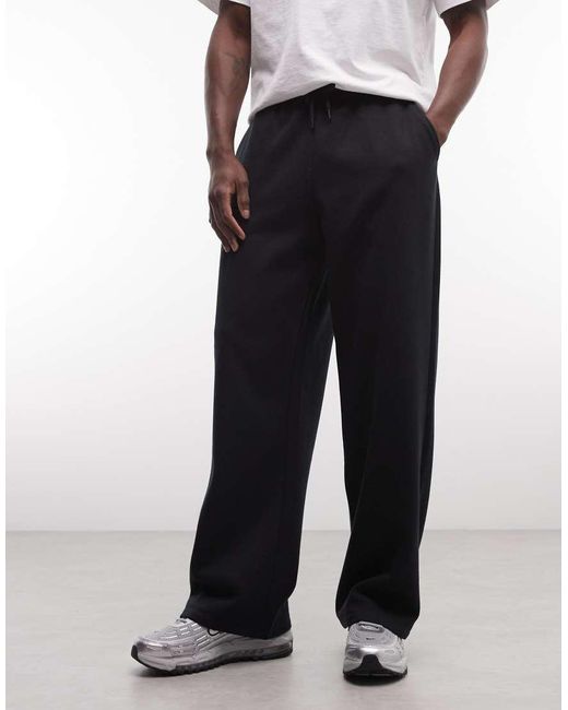 Collusion White Relaxed Sweatpants for men