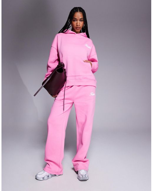 Studio - sweat à capuche oversize d'ensemble avec imprimé cerises au dos - vif Kaiia en coloris Pink