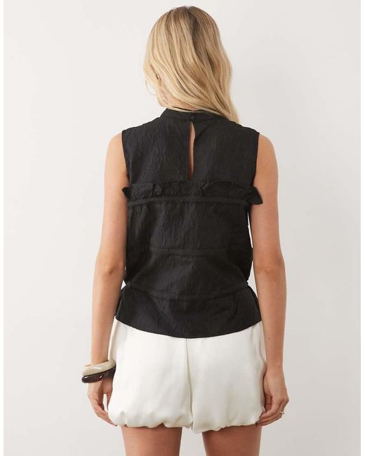 Ghospell Black Amina High Neck Sleeveless Drawstring Top