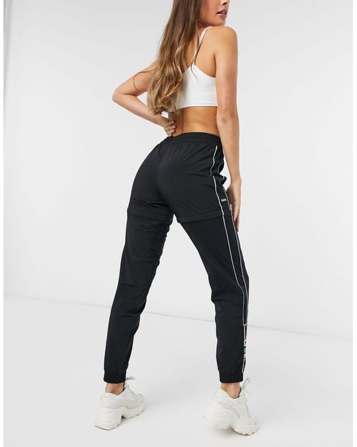 PUMA Queen Track Pants With Zip Details in Black | Lyst Australia
