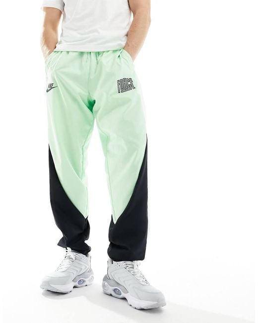Nike Basketball Green Starting 5 Woven Trousers for men