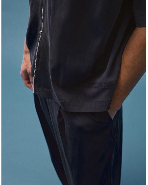 Bershka Blue Fluid Super baggy Darted Trousers for men