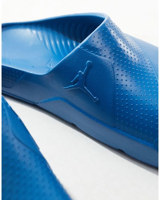 Sandalias azules post Nike de color Blue
