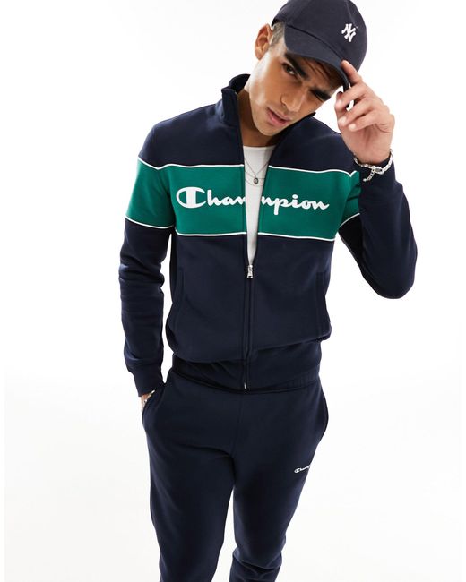 Chándal verde y con logo Champion de hombre de color Blue