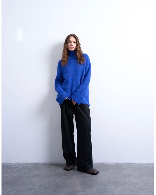 TOPSHOP Blue – hochgeschlossener longline-strickpullover mit ausschnitt-detail und oversize-passform