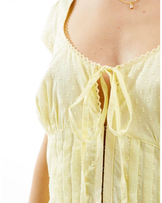 Combishort en plumetis avec taille imitation corset - citron ASOS en coloris Natural
